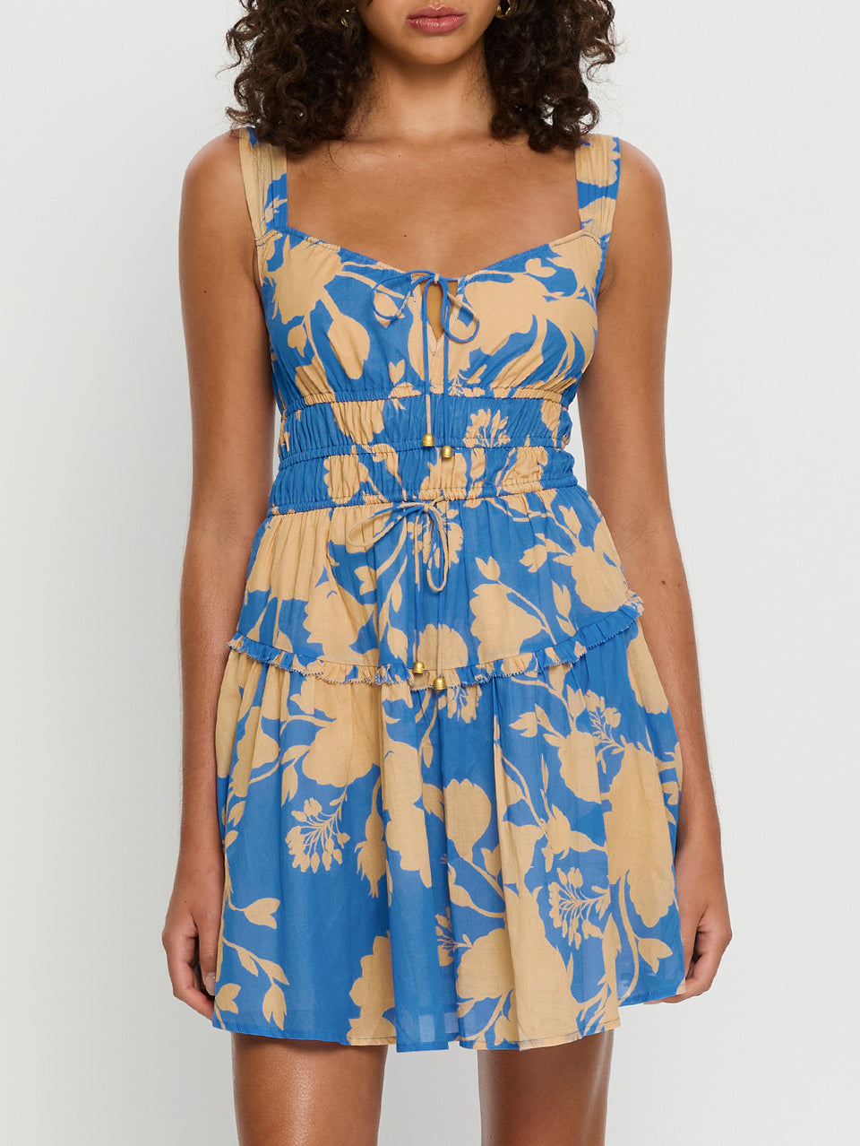 Aurora Mini Gathered Dress KIVARI | Model wears blue floral mini dress