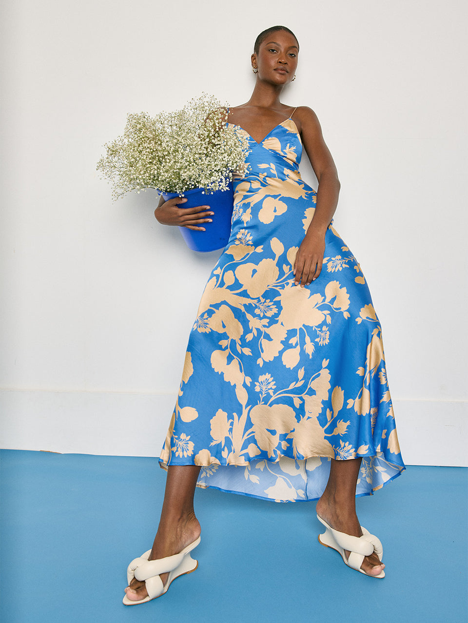 Aurora Strappy Maxi Dress KIVARI Model wears blue floral maxi dress campaign
