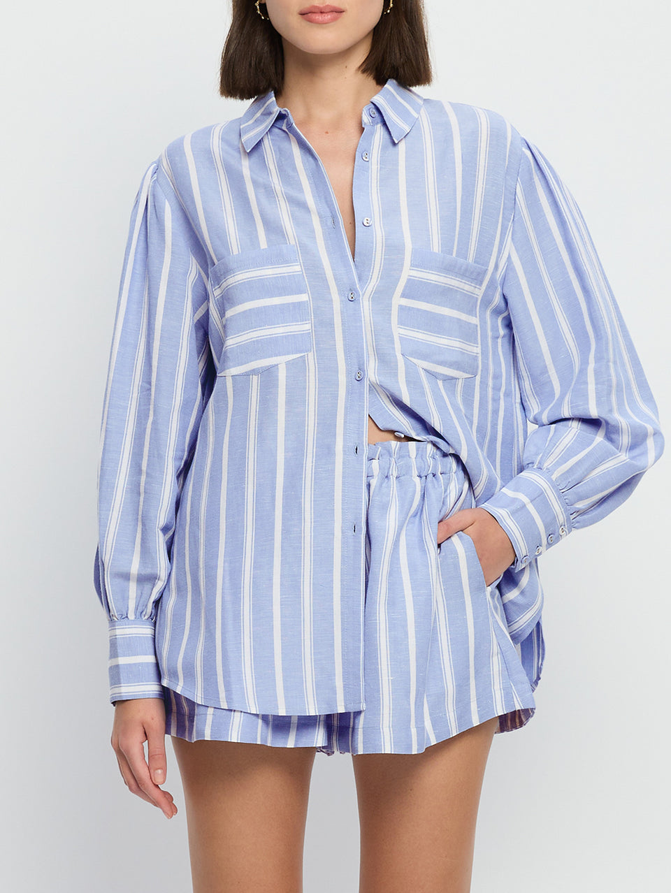 Capri Shirt KIVARI | Model wears blue and white stripe shirt