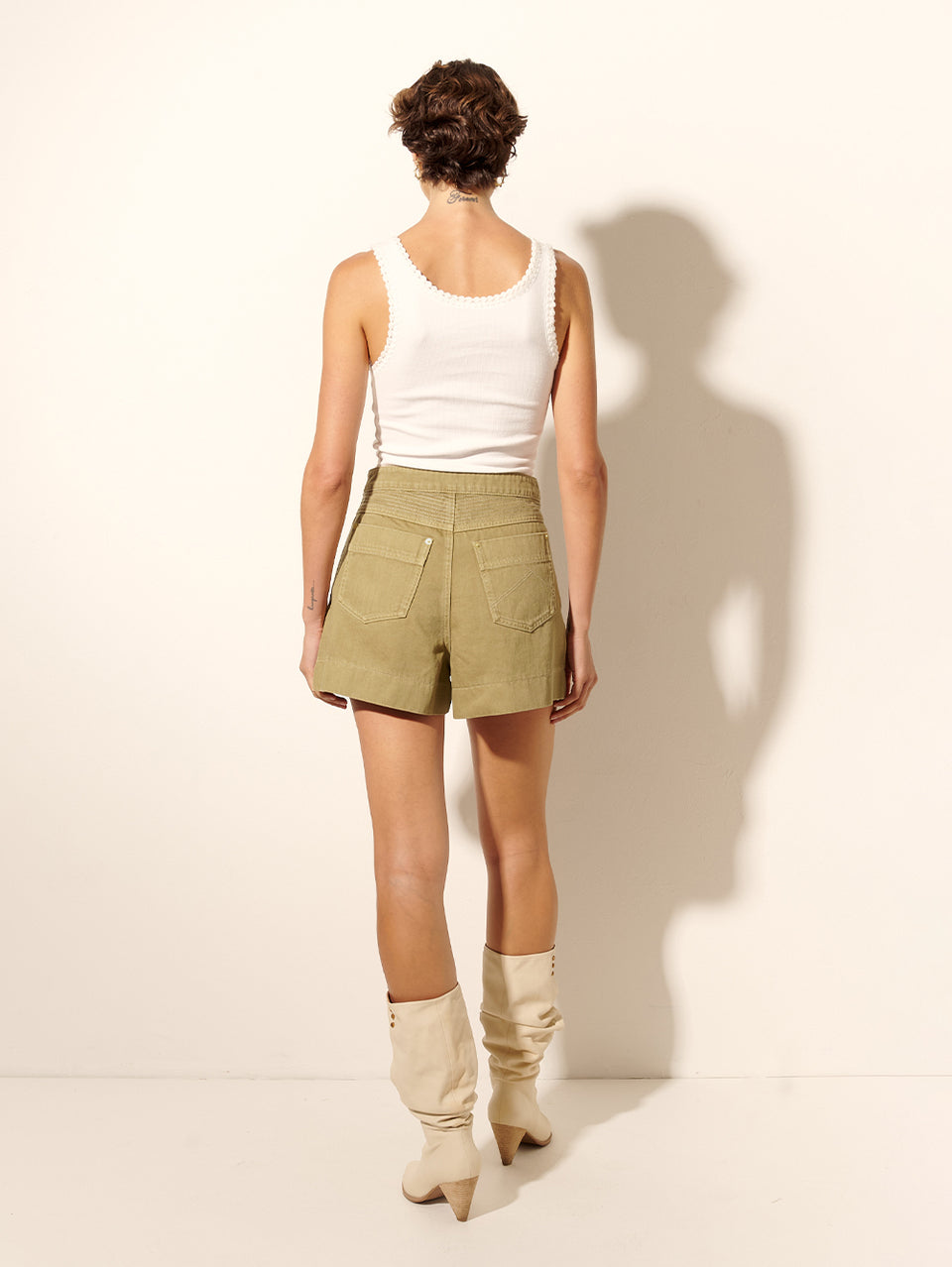 Celene Denim Short Khaki KIVARI | Model wears khaki denim short back view