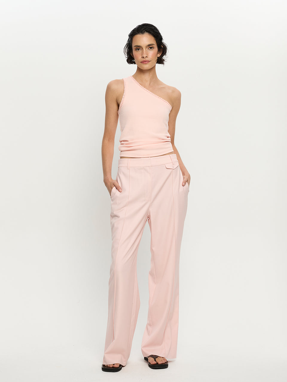 Model wearing Pink top and pants