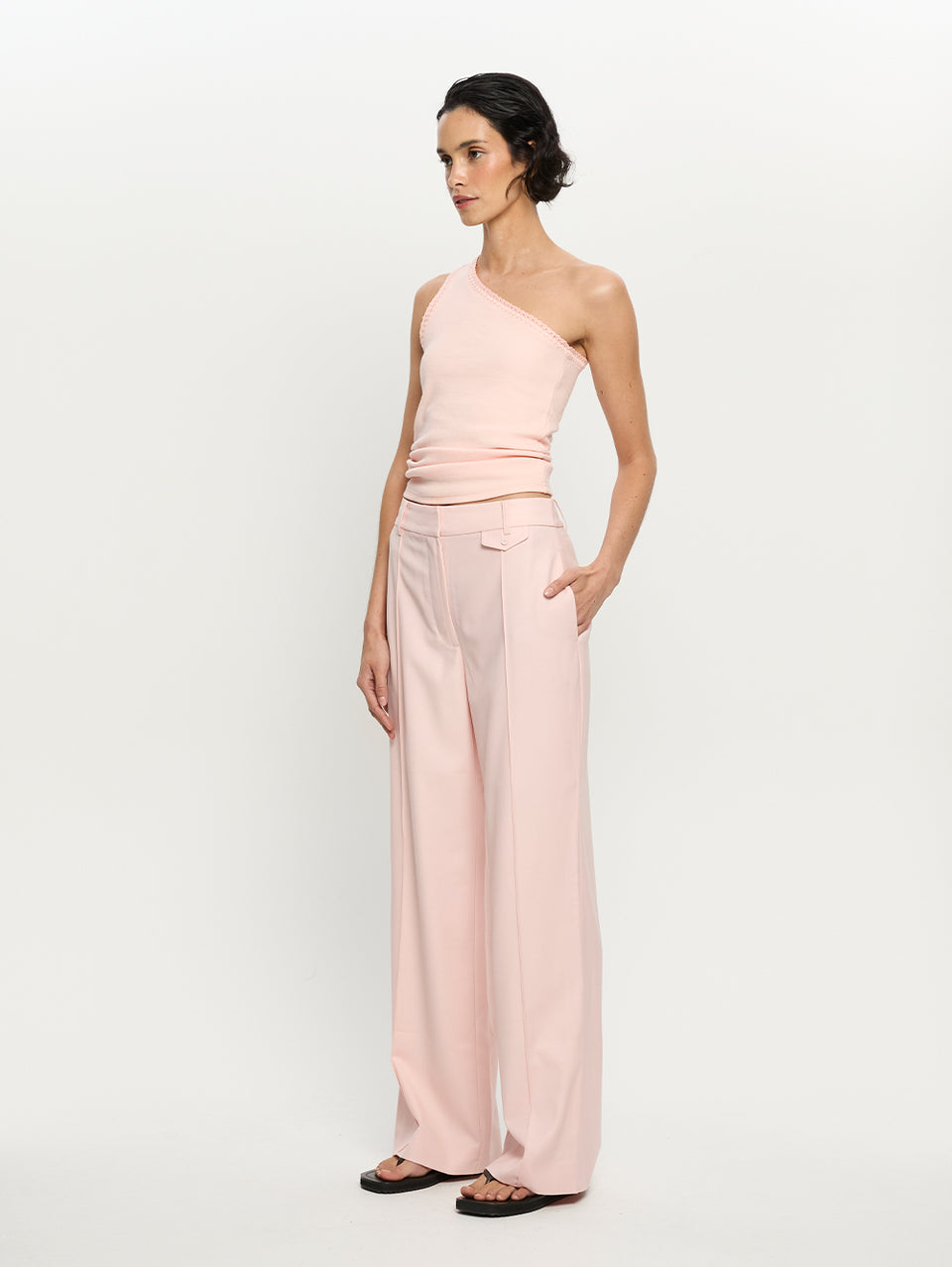 Model wearing Pink top and pants