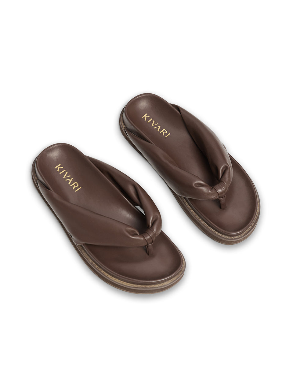 Pair of brown sandals with 'Kivari' branding on a white background