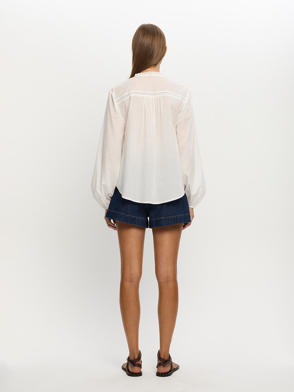 Woman in white blouse