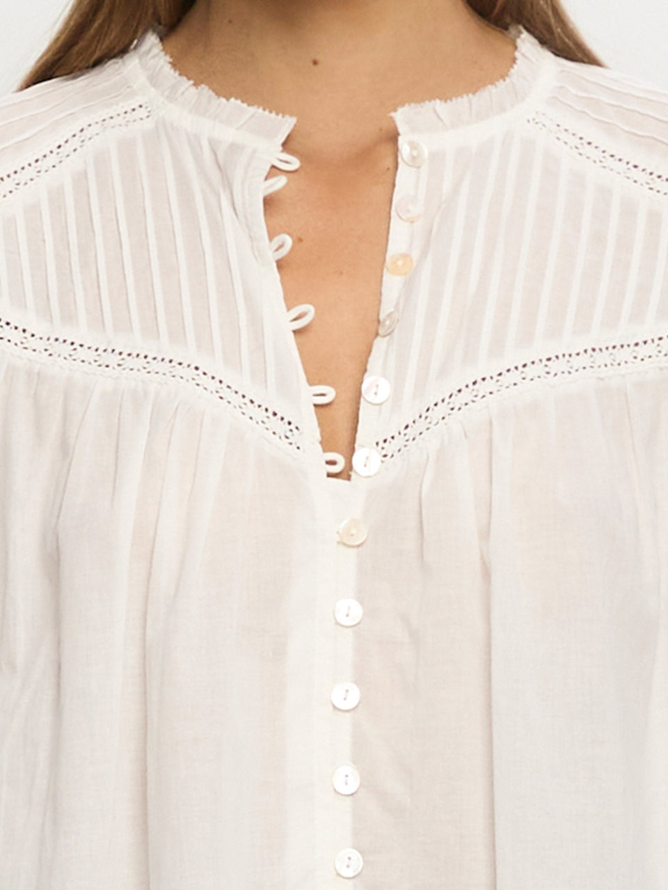 Woman in white blouse