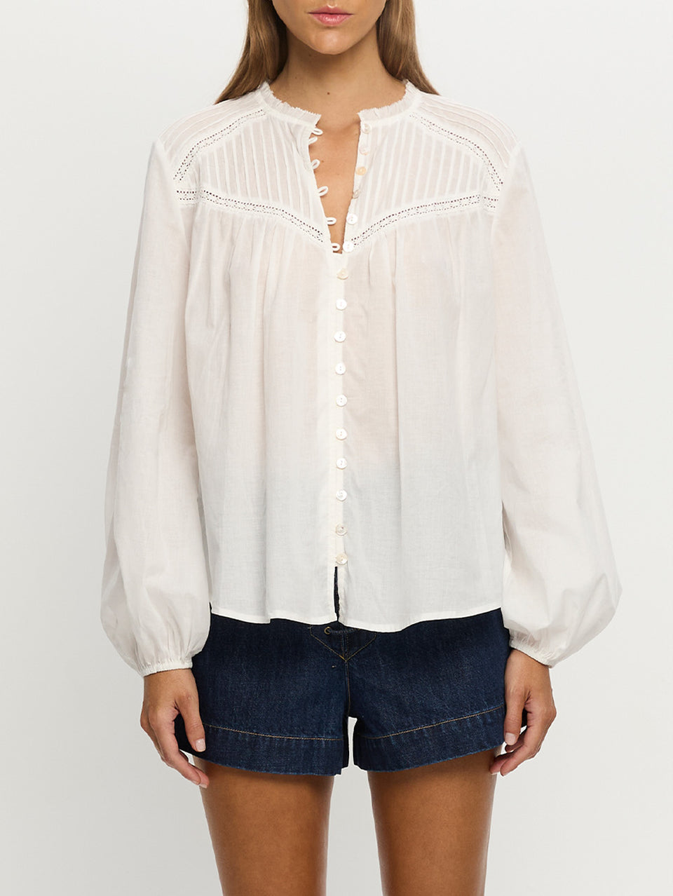 Woman in white blouse