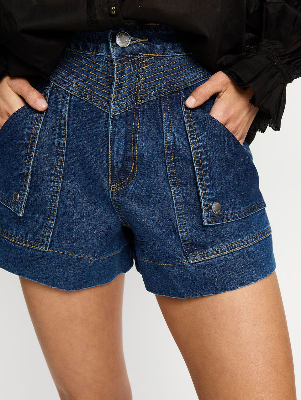 Celene Denim Short Indigo | Model wears blue denim short with Black top