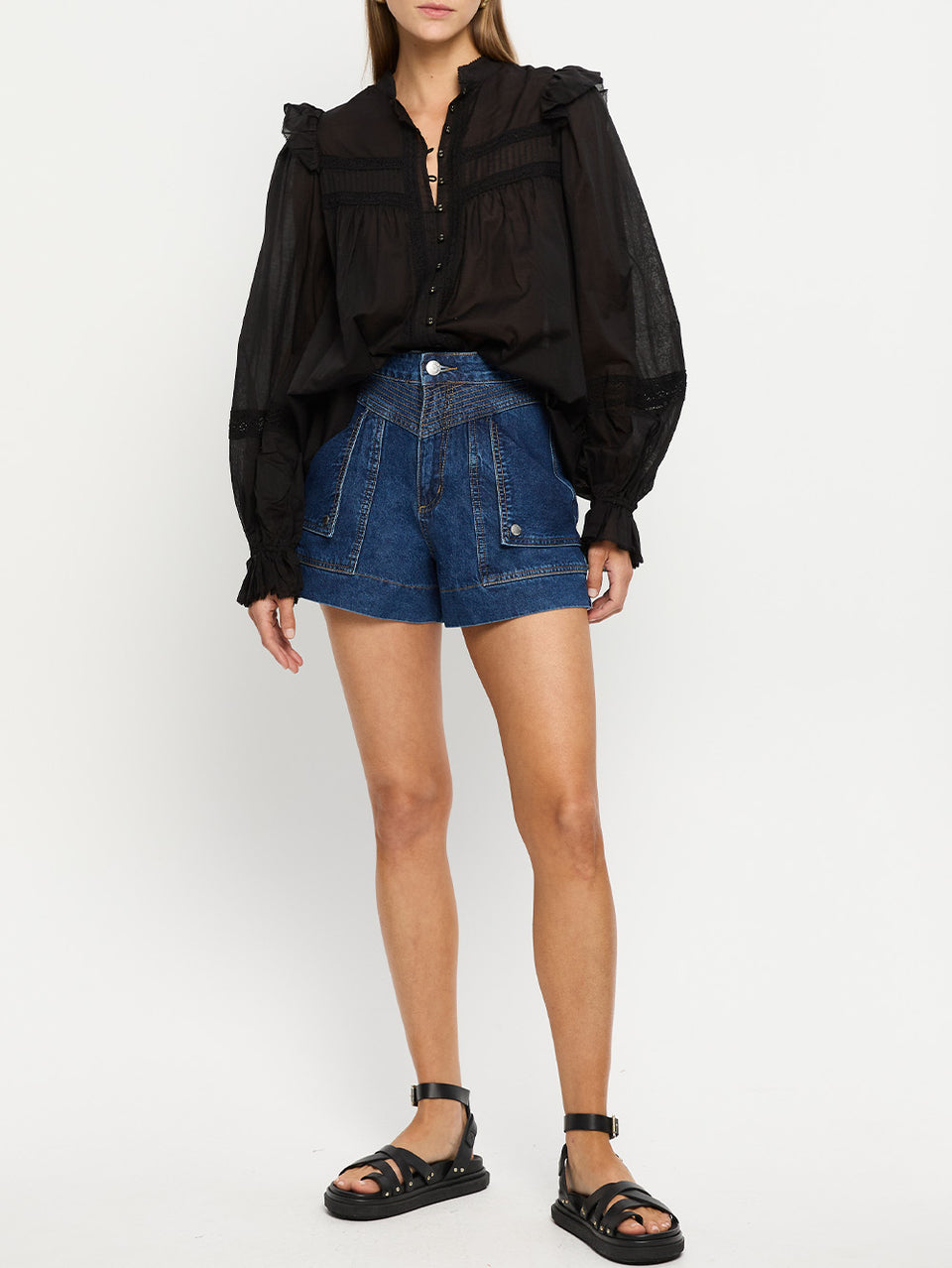 Celene Denim Short Indigo | Model wears blue denim short with Black top