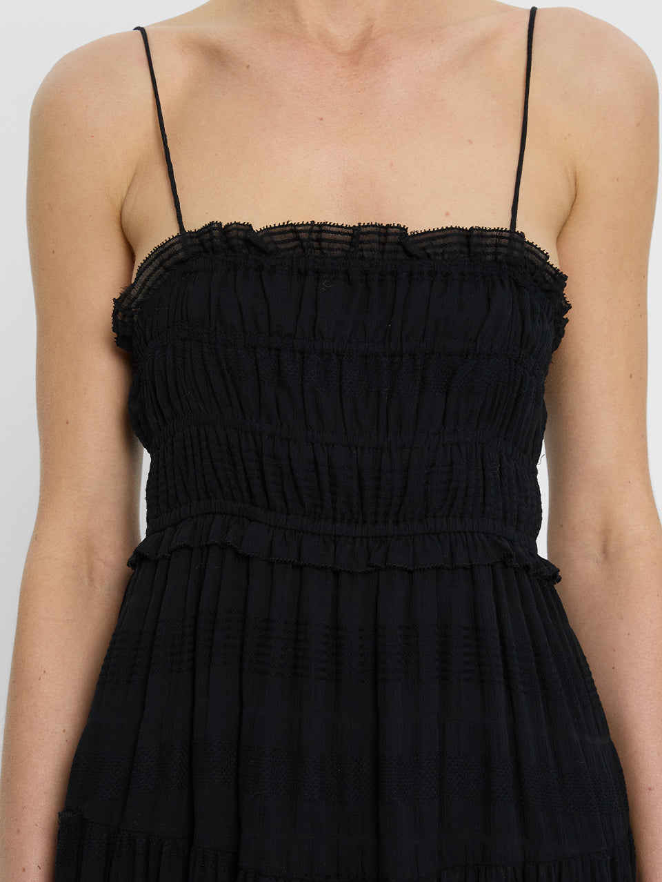 Rylan Maxi Dress KIVARI | Model wears black maxi dress close up