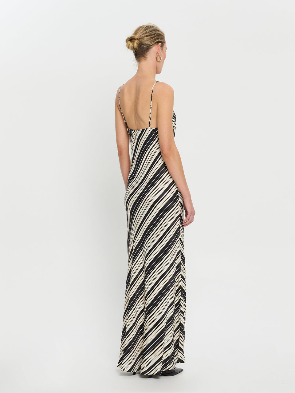 Sara Slip Dress KIVARI | Model wears stripe slip dress back view