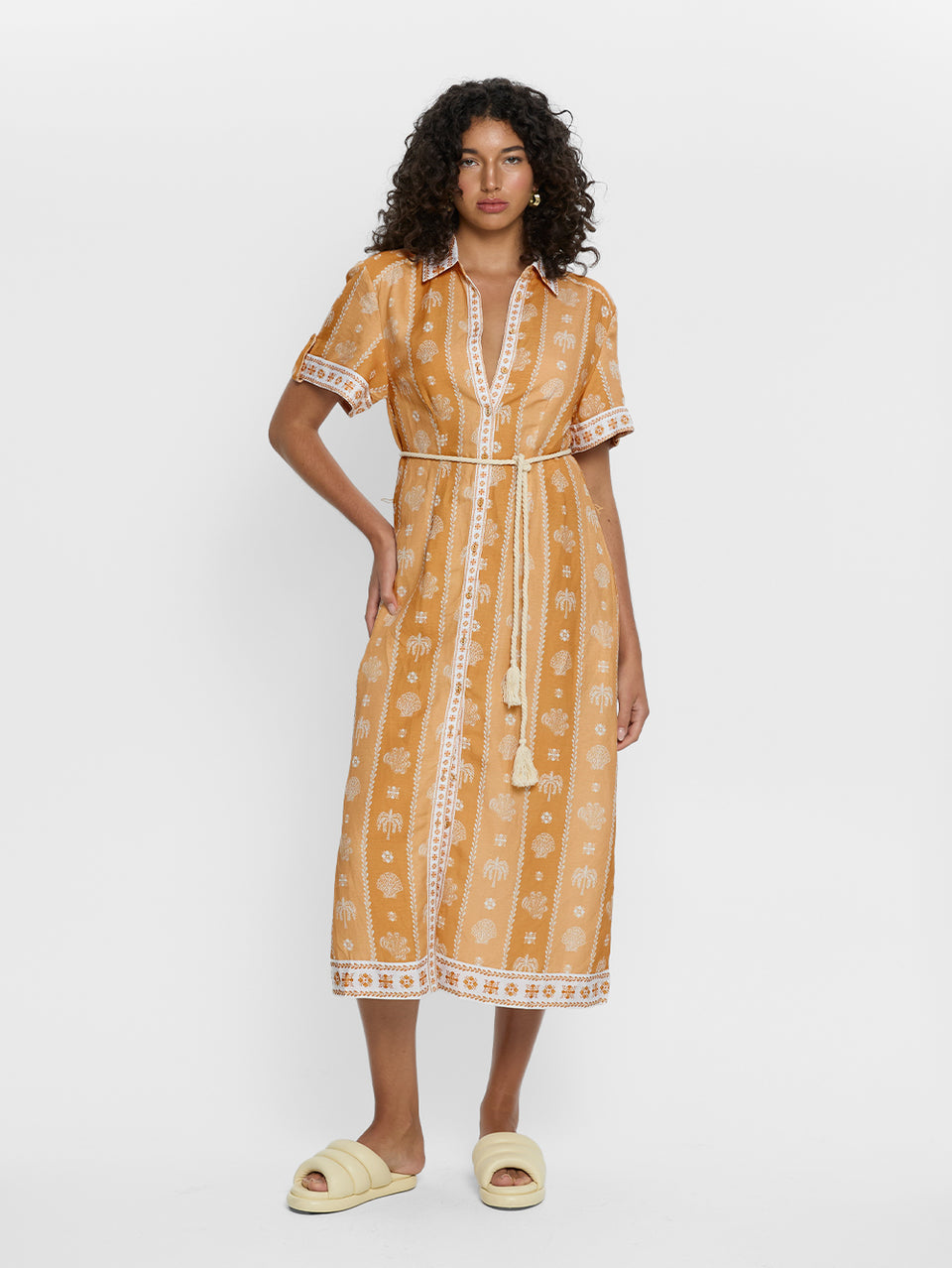 Sienna Midi Dress KIVARI | Model wears orange print midi dress