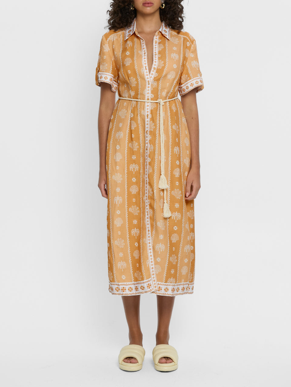Sienna Midi Dress KIVARI | Model wears orange print midi dress