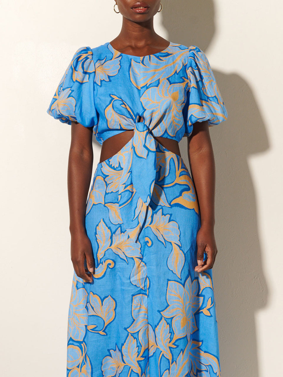 Taniana Cut Out Maxi Dress KIVARI | Model wears blue and orange floral maxi dress close up