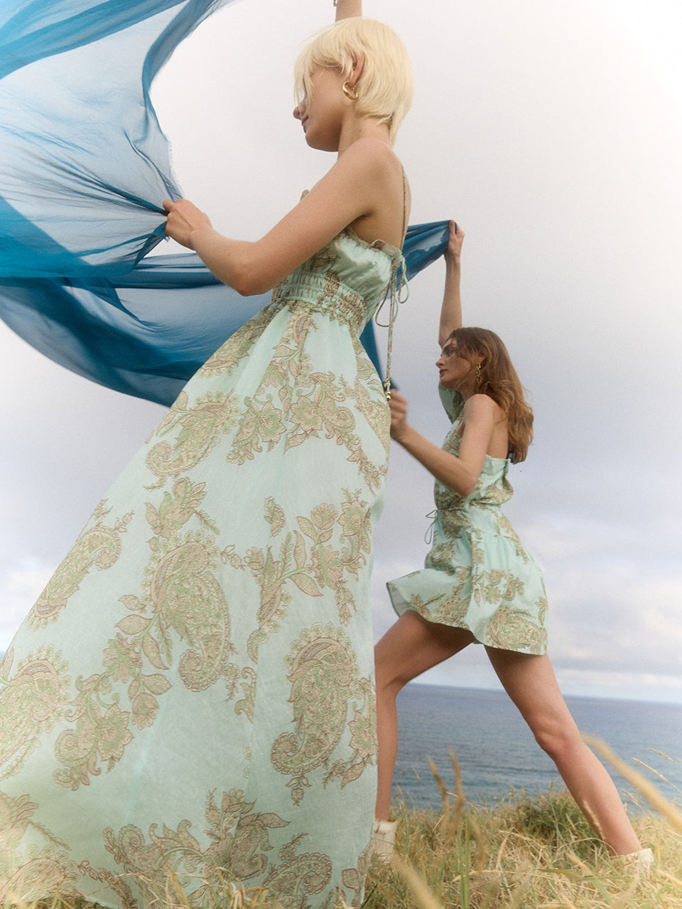 Zoe Strappy Midi Dress KIVARI | Model wears aqua paisley midi dress campaign