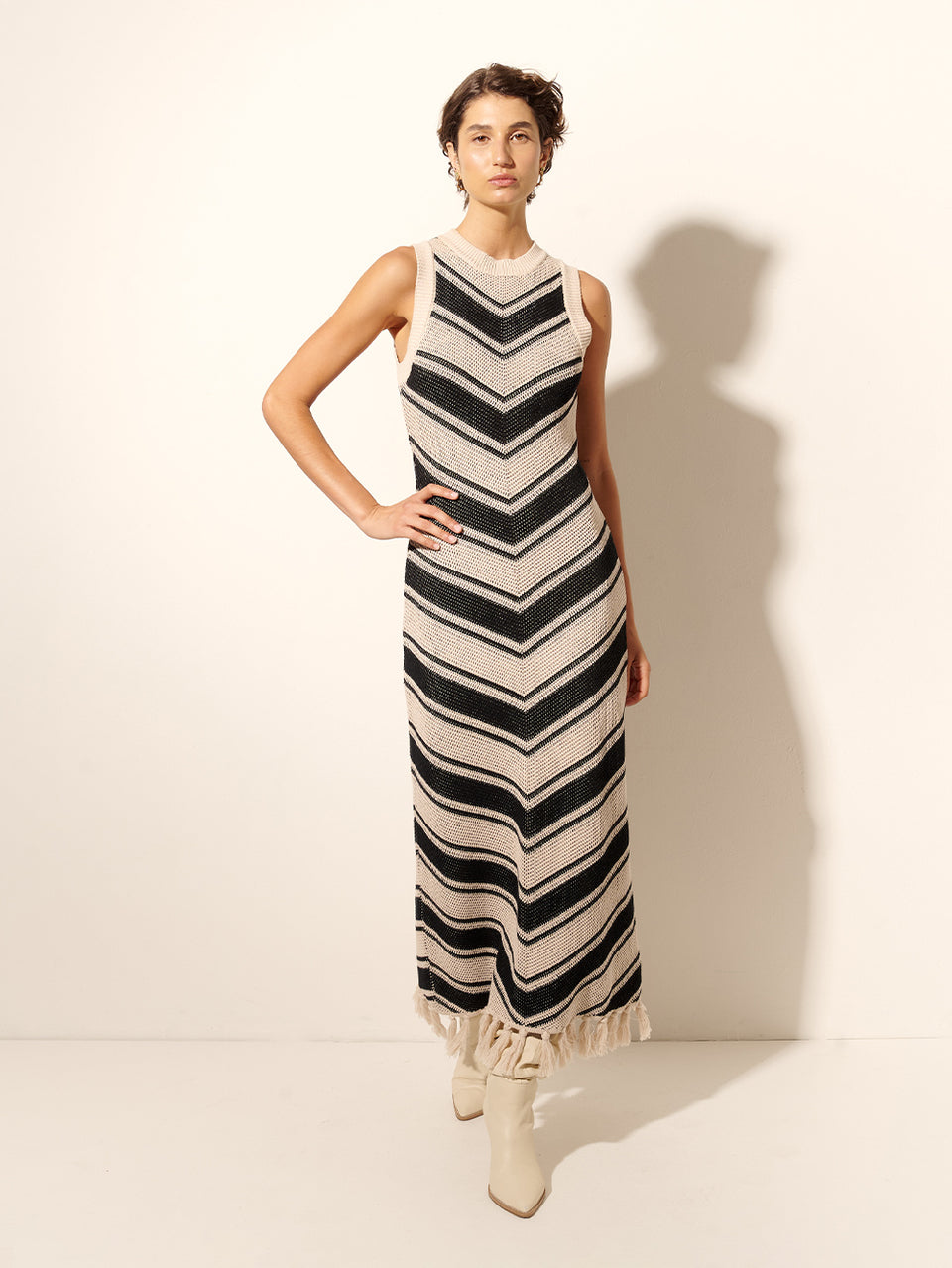 Anita Knit Midi Dress KIVARI | Model wears black and white chevron knit dress
