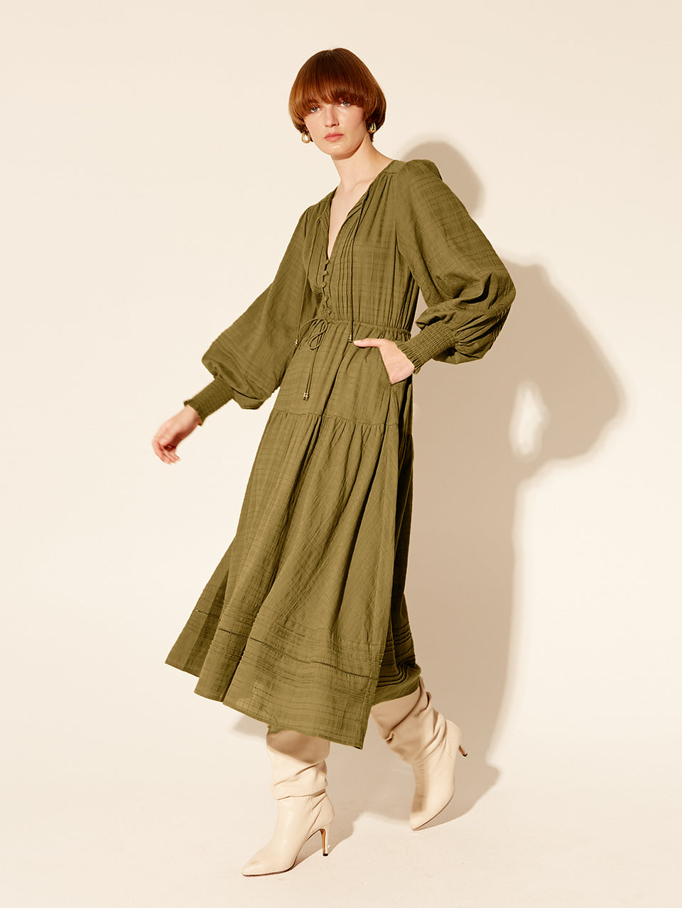 Antonella Maxi Dress KIVARI | Model wears khaki maxi dress side view