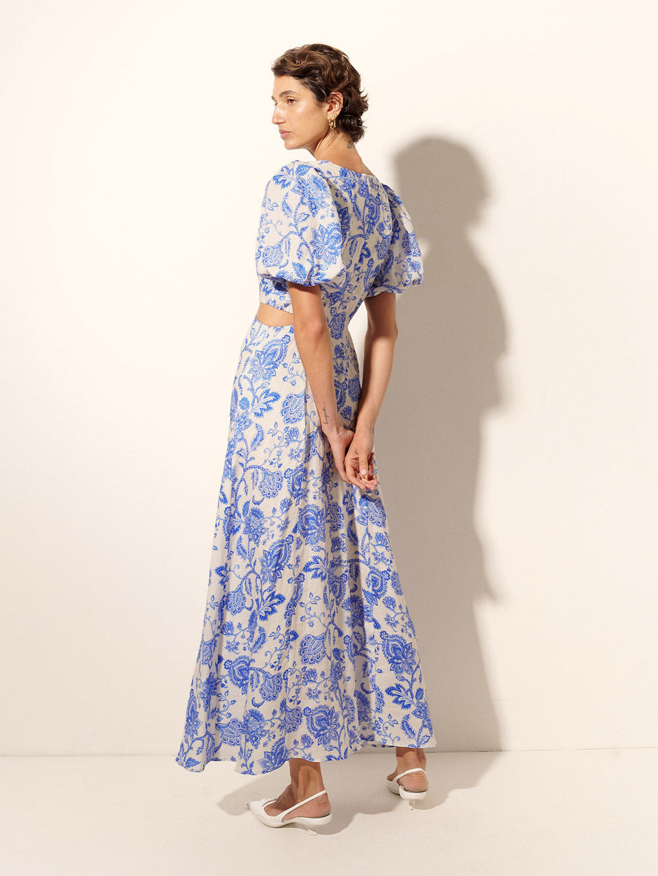 Athena Maxi Dress KIVARI | Model wears blue and white paisley maxi dress back view