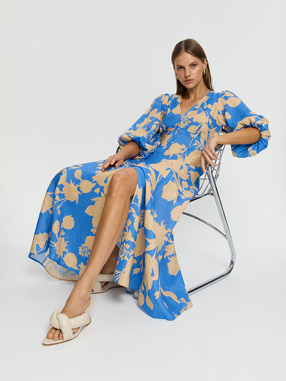 Aurora Maxi Dress KIVARI | Model wears blue floral maxi dress vibe