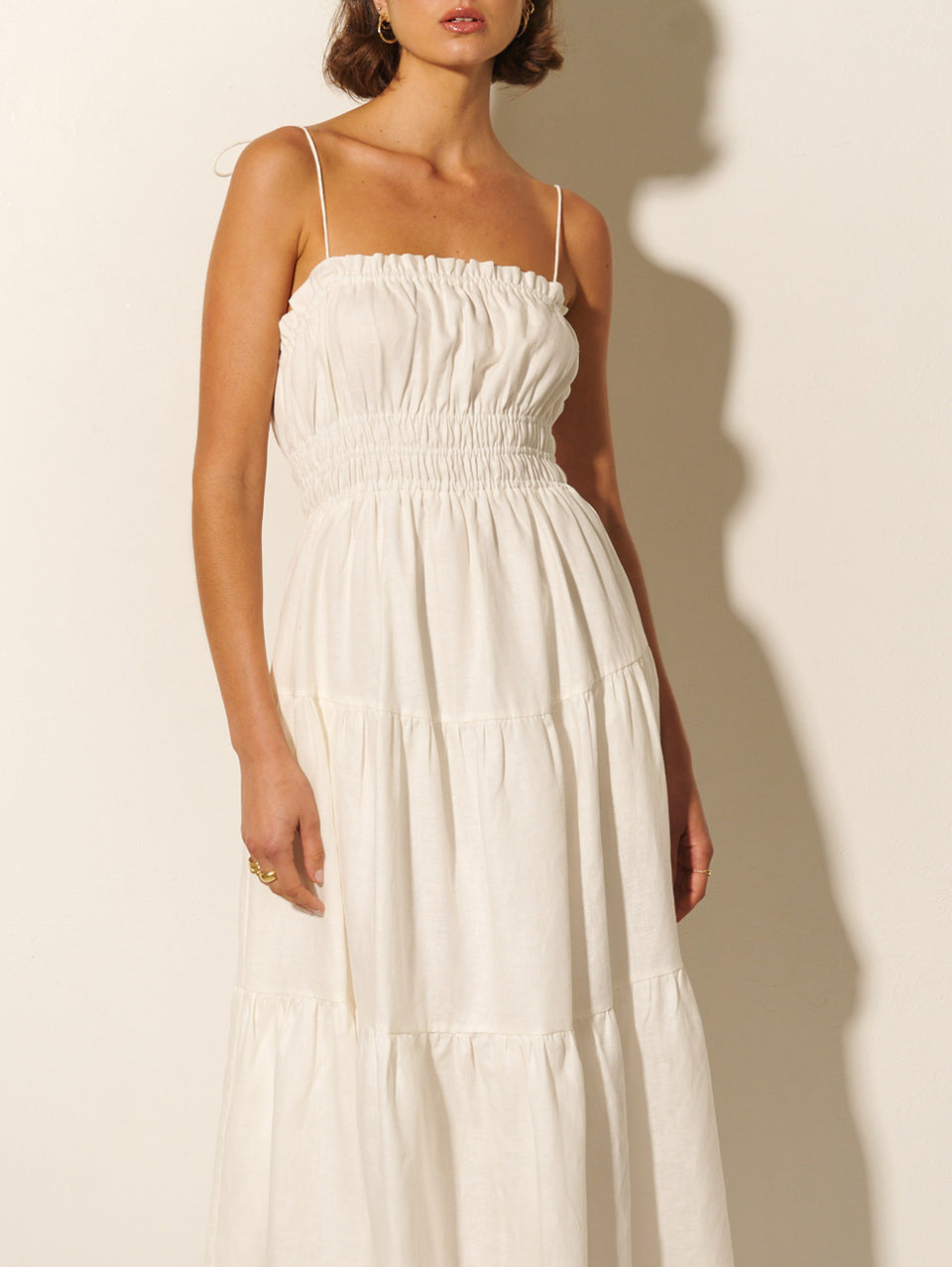 Corine Midi Dress KIVARI | Model wears ivory midi dress close up