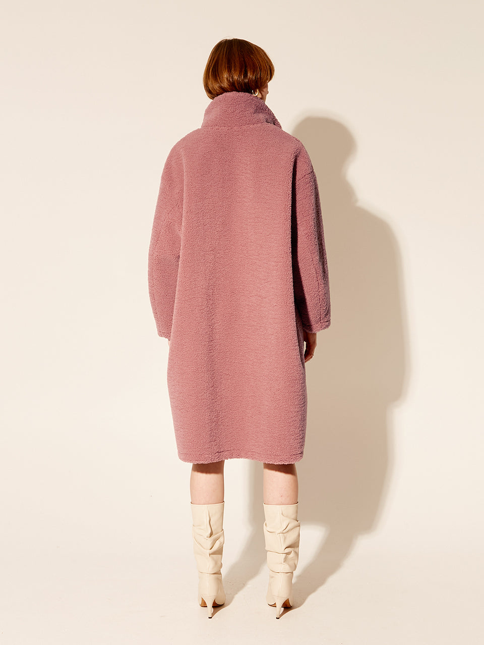 Clara Coat KIVARI | Model wears pink fluffy coat back view