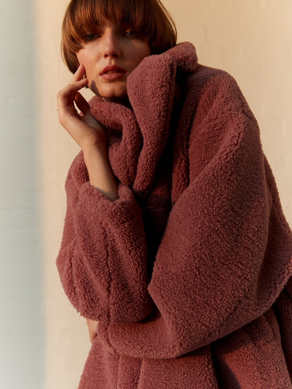 Clara Coat KIVARI | Model wears pink fluffy coat  campaign
