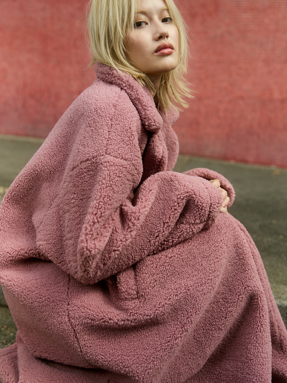 Clara Coat KIVARI | Model wears pink fluffy coat campaign