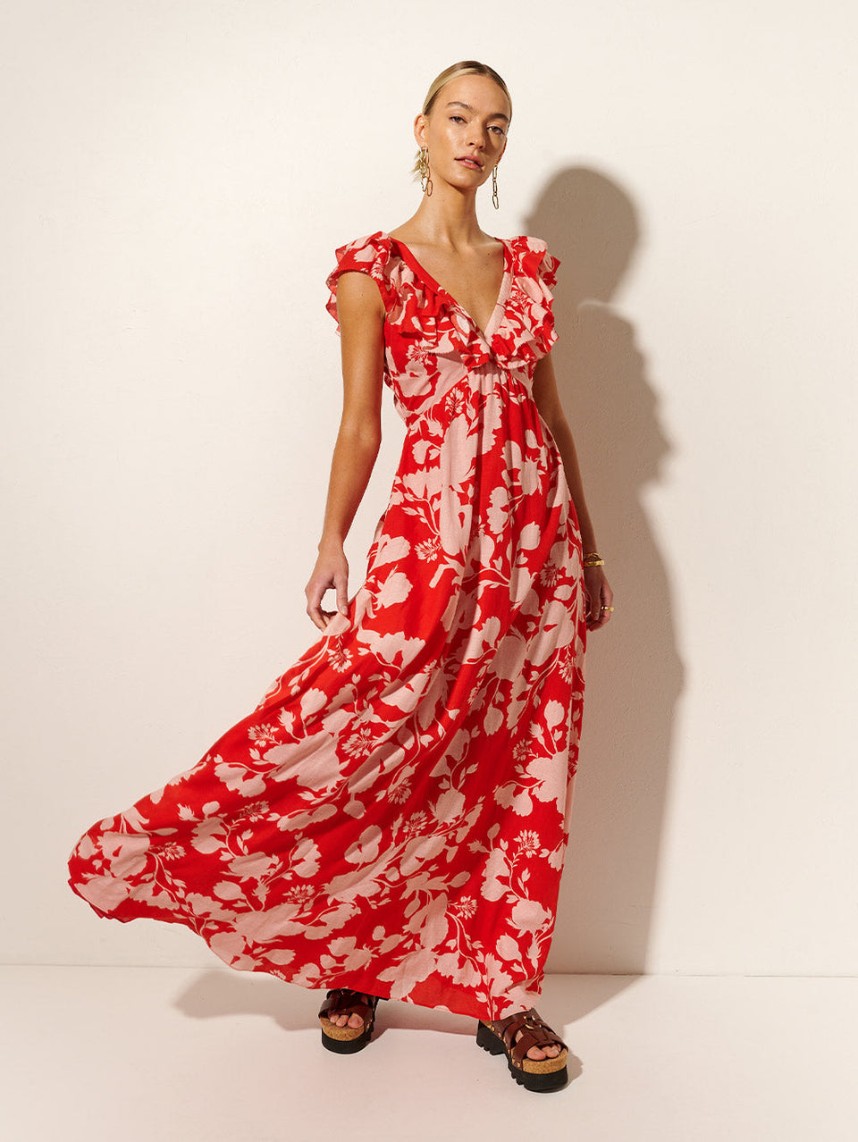 Delfina Ruffle Maxi Dress KIVARI | Model wears pink and red floral maxi dress