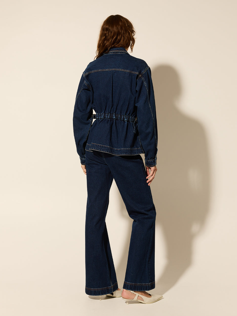 Dominique Jacket KIVARI | Model wears dark denim jacket back view