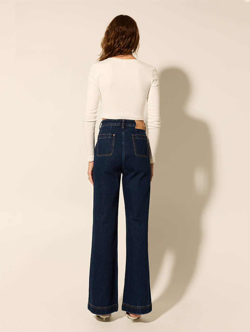 Dominique Jean KIVARI | Model wears denim jean back view