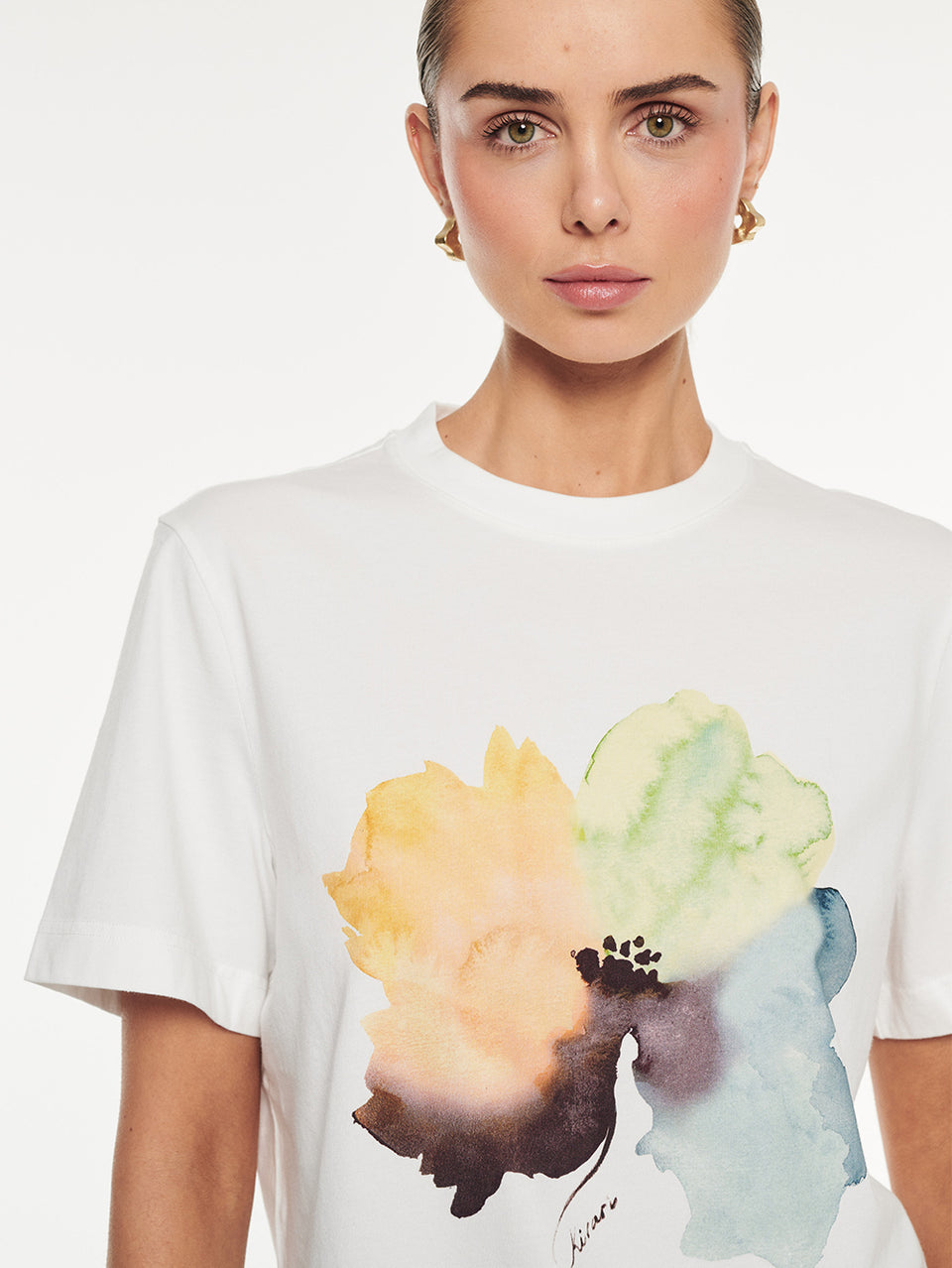 Lotte Tee in Yellow print, close-up of crewneck t-shirt with watercolor floral graphic