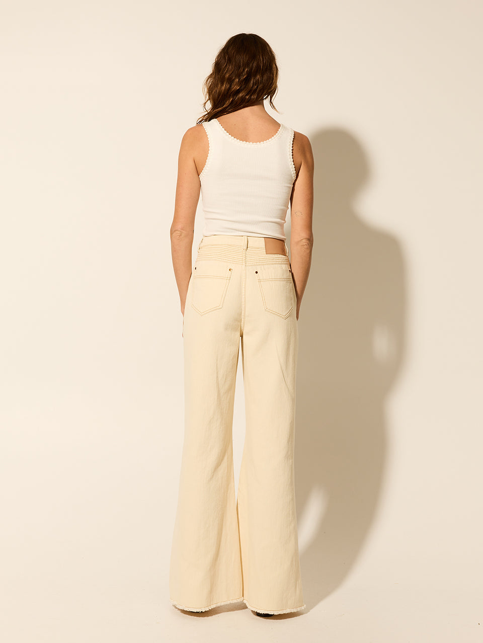 Elena Jean Cream KIVARI | Model wears cream jean back view