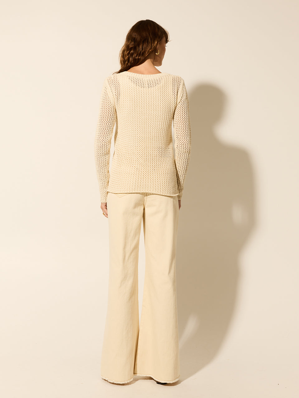 Eliana Knit Cream KIVARI | Model wears cream knit top back view