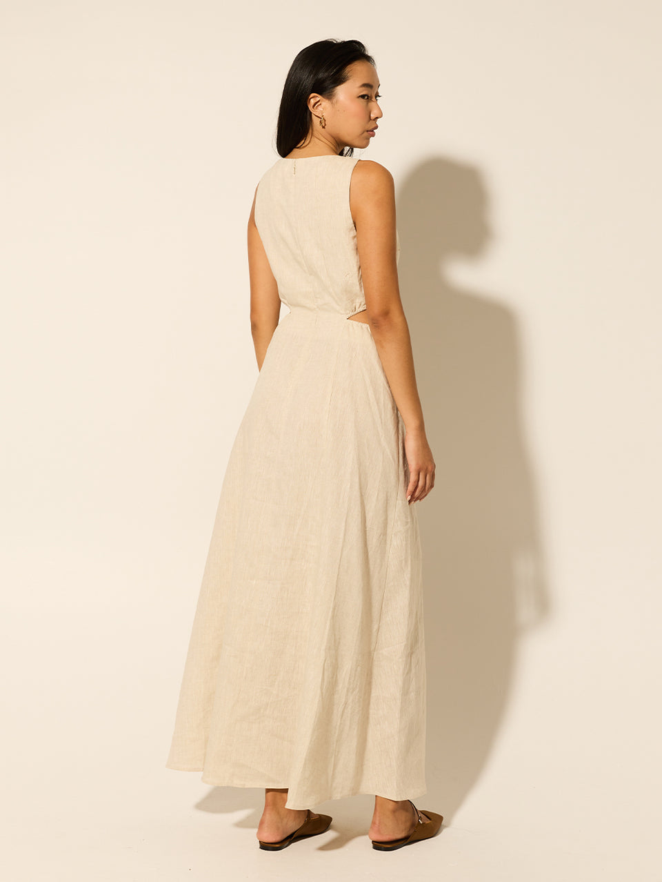 Ellie Cut Out Maxi Dress KIVARI | Model wears neutral linen maxi dress back view