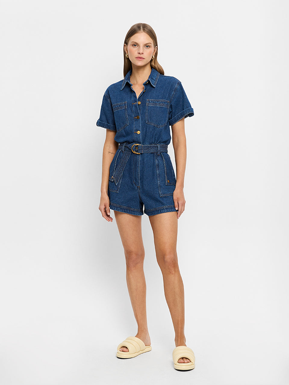 Georgie Denim Indigo KIVARI | Model wears indigo blue denim playsuit