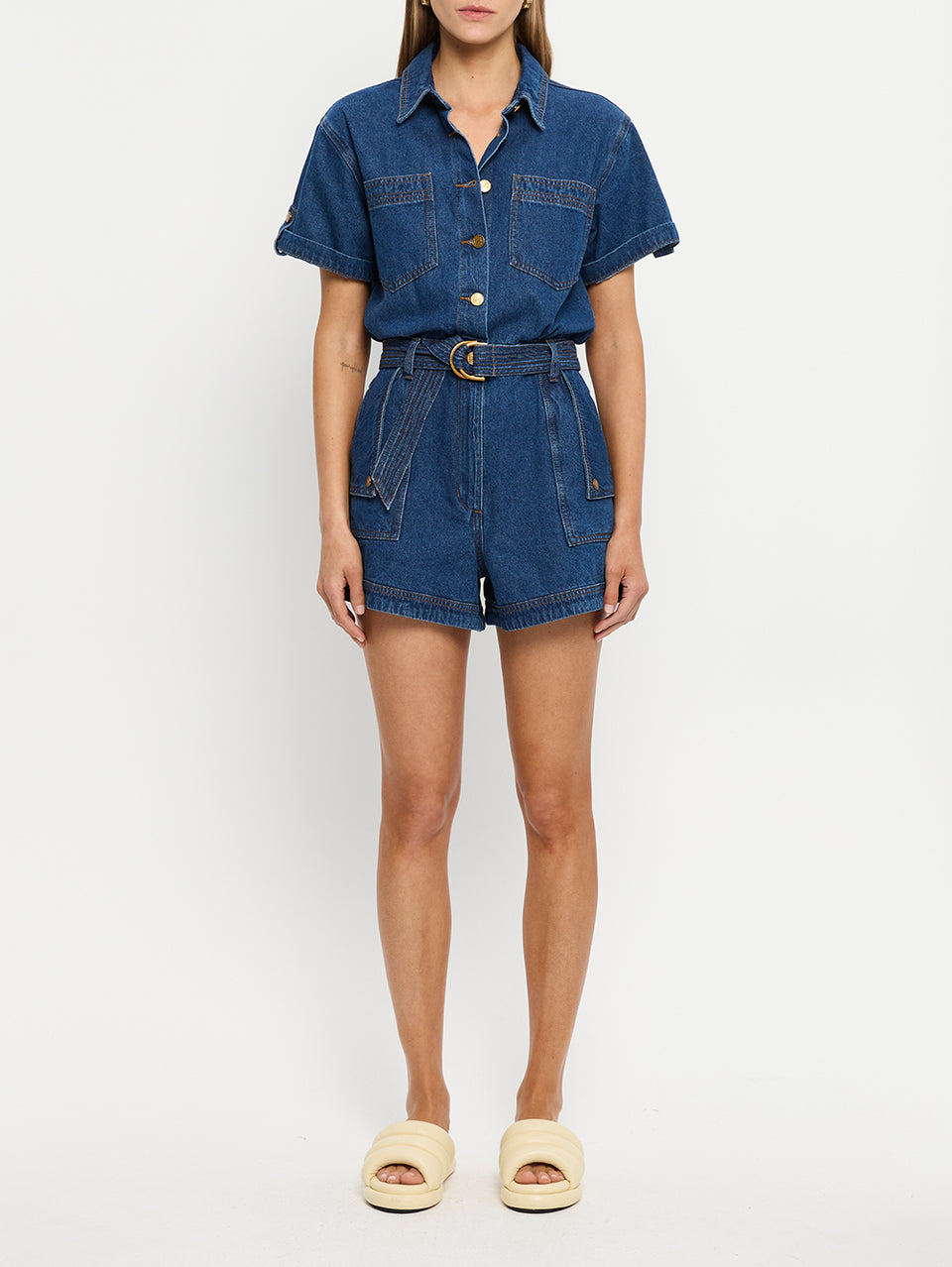 Georgie Denim Indigo KIVARI | Model wears indigo blue denim playsuit
