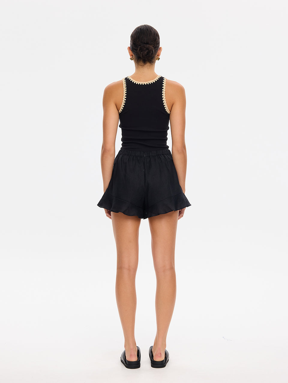 KIVARI Azarea black tank top and shorts set, back view with mule sandals