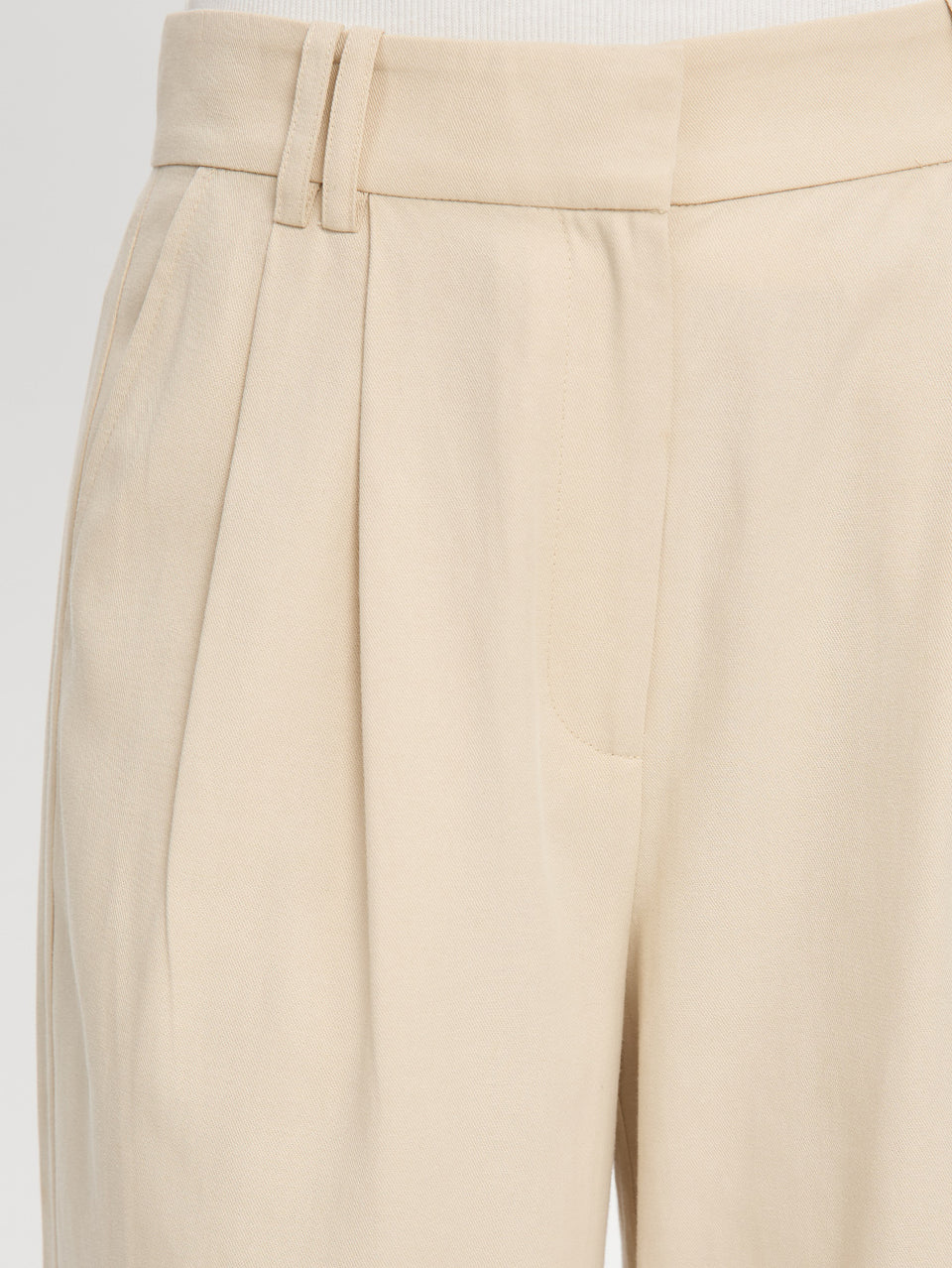 Beige pants with a plain background
