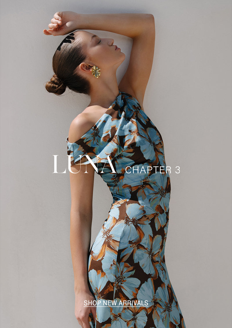 KIVARI LUNA Chapter 3 hero mobile banner - model wearing blue and brown floral halterneck dress shop new arrivals