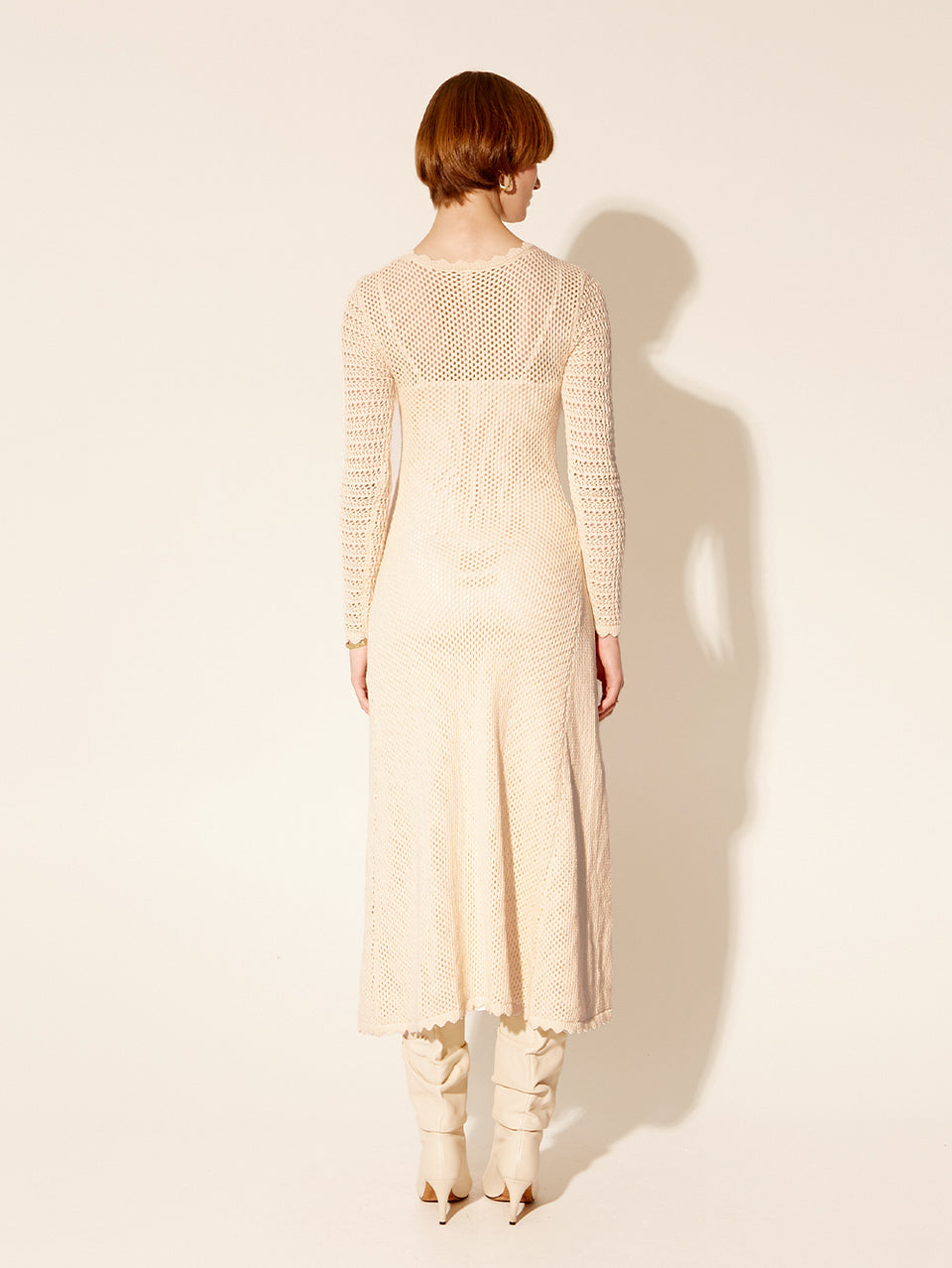 Ingrid Knit Midi Dress KIVARI | Model wears white knit dress back view
