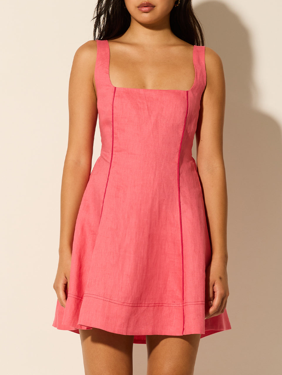 Jenna Mini Dress KIVARI | Model wears pink mini dress close up