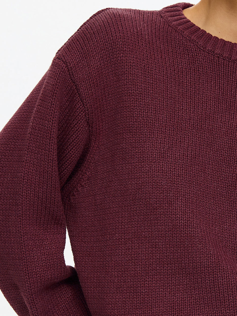 KIVARI Odette Crew Neck Jumper in Plum – close-up detail shot showing ribbed knit texture and crew neckline of women's dark plum knit sweater