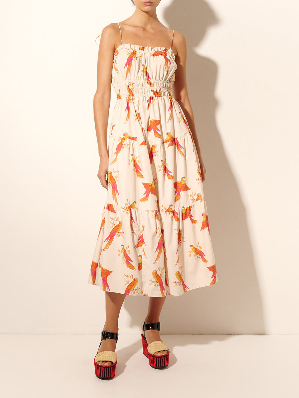 Kaylee Midi Dress KIVARI | Model wears pink and orange bird print midi dress