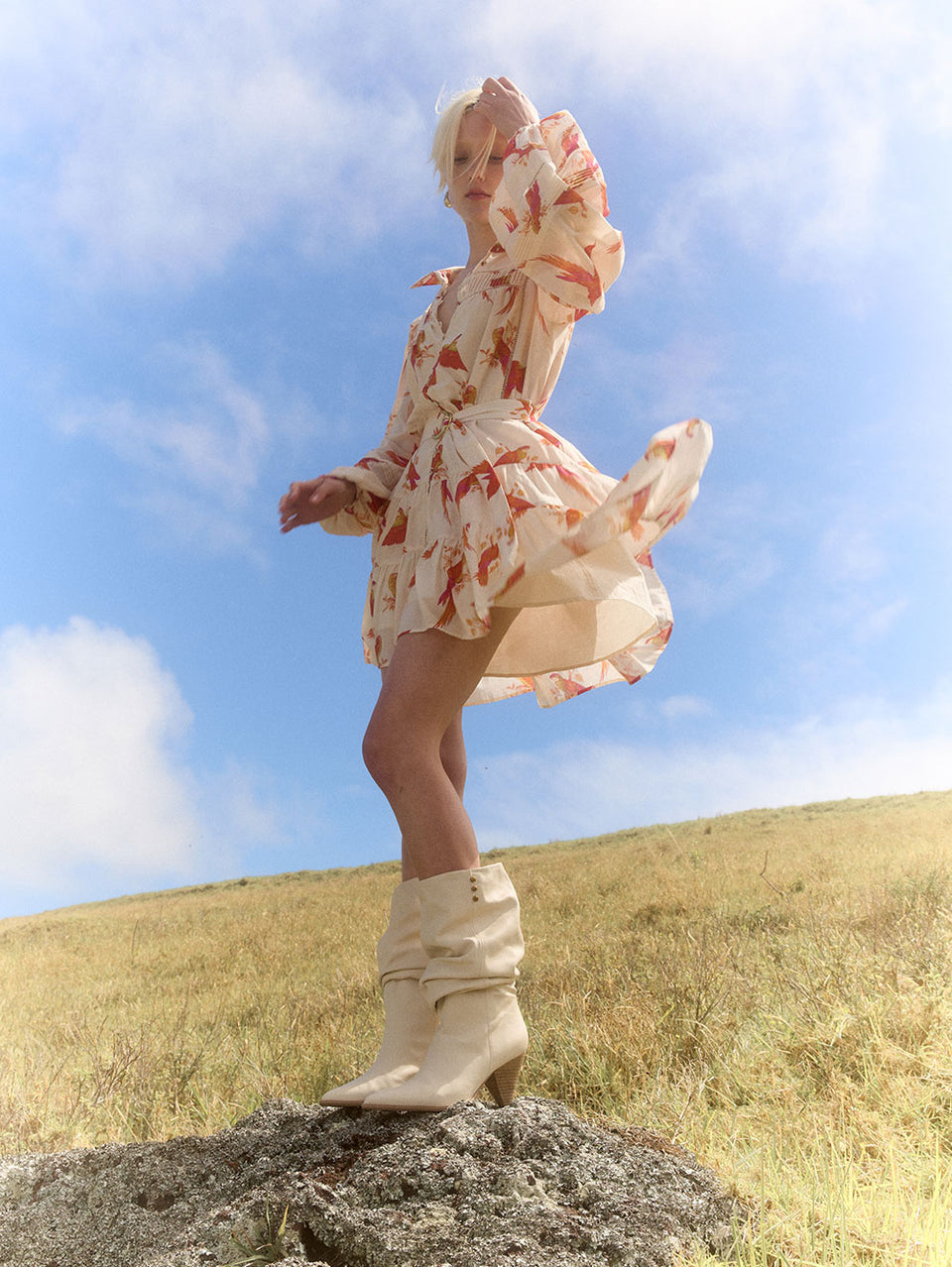 Kaylee Mini Dress KIVARI | Model wears pink and orange bird print mini dress campaign