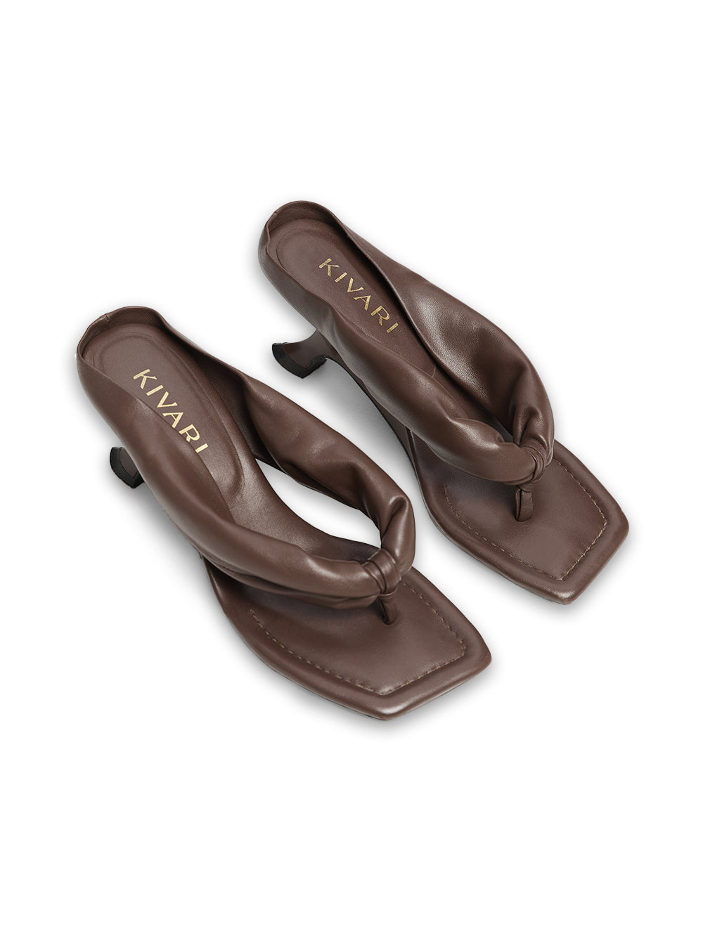 Pair of brown sandals with 'KIVARI' branding on a white background