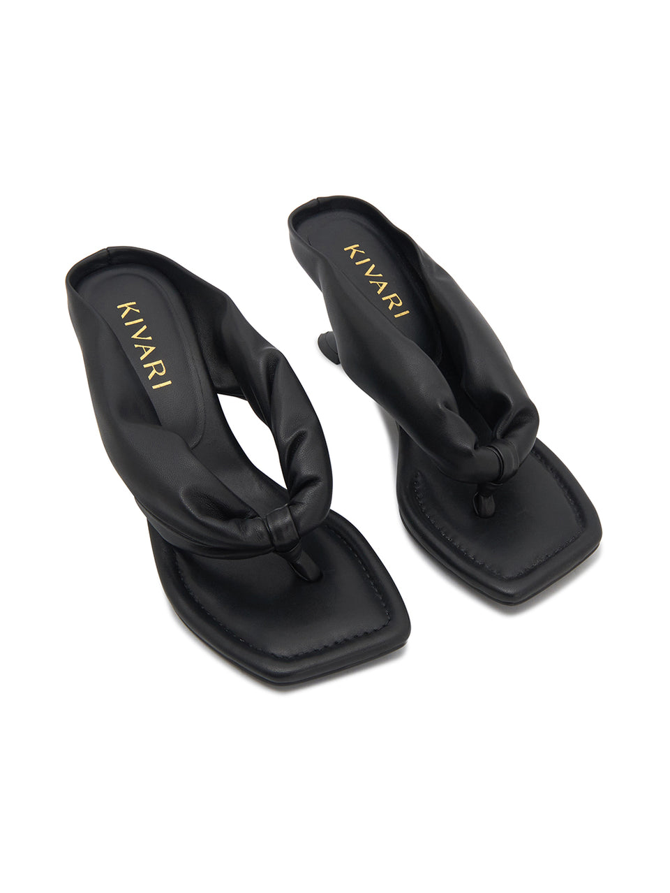 Black sandals with 'Kivari' branding on a white background