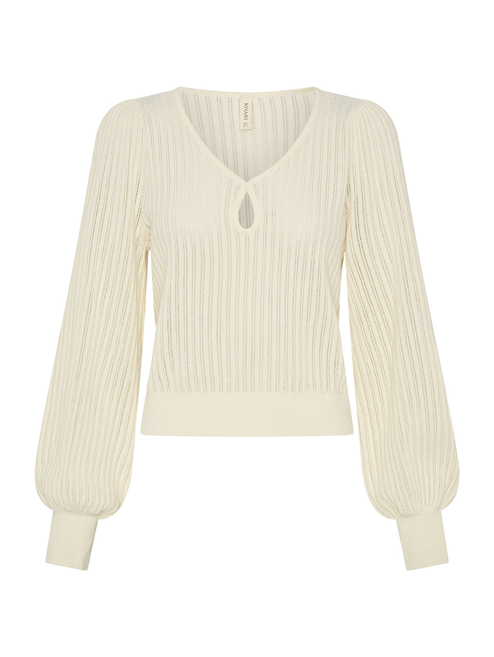 Cream-colored ribbed sweater on a white background
