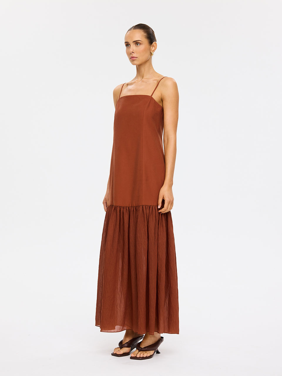 KIVARI Elanor Maxi Dress in Hazel – full-length diagonal view of model wearing women's hazel square-neck tiered maxi dress