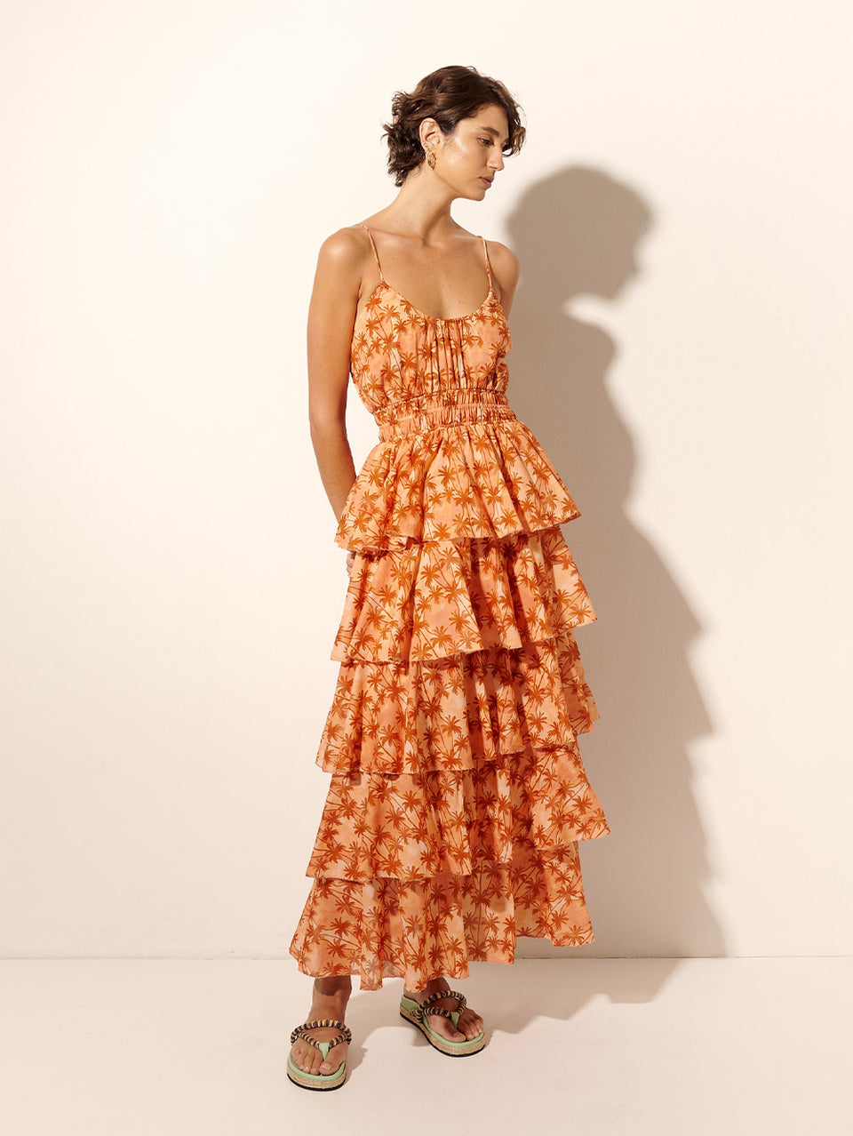 Leilani Maxi Dress KIVARI | Model wears bronze and peach palm printed maxi dress