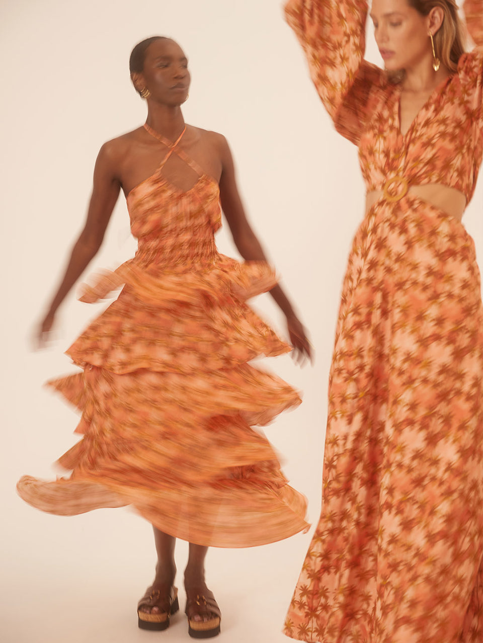Leilani Maxi Dress KIVARI | Model wears bronze and peach palm printed maxi dress campaign