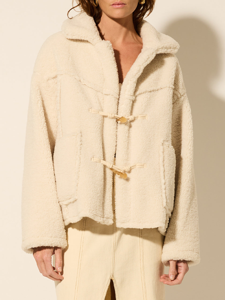 Lianna Jacket KIVARI | Model wears cream reversible jacket close